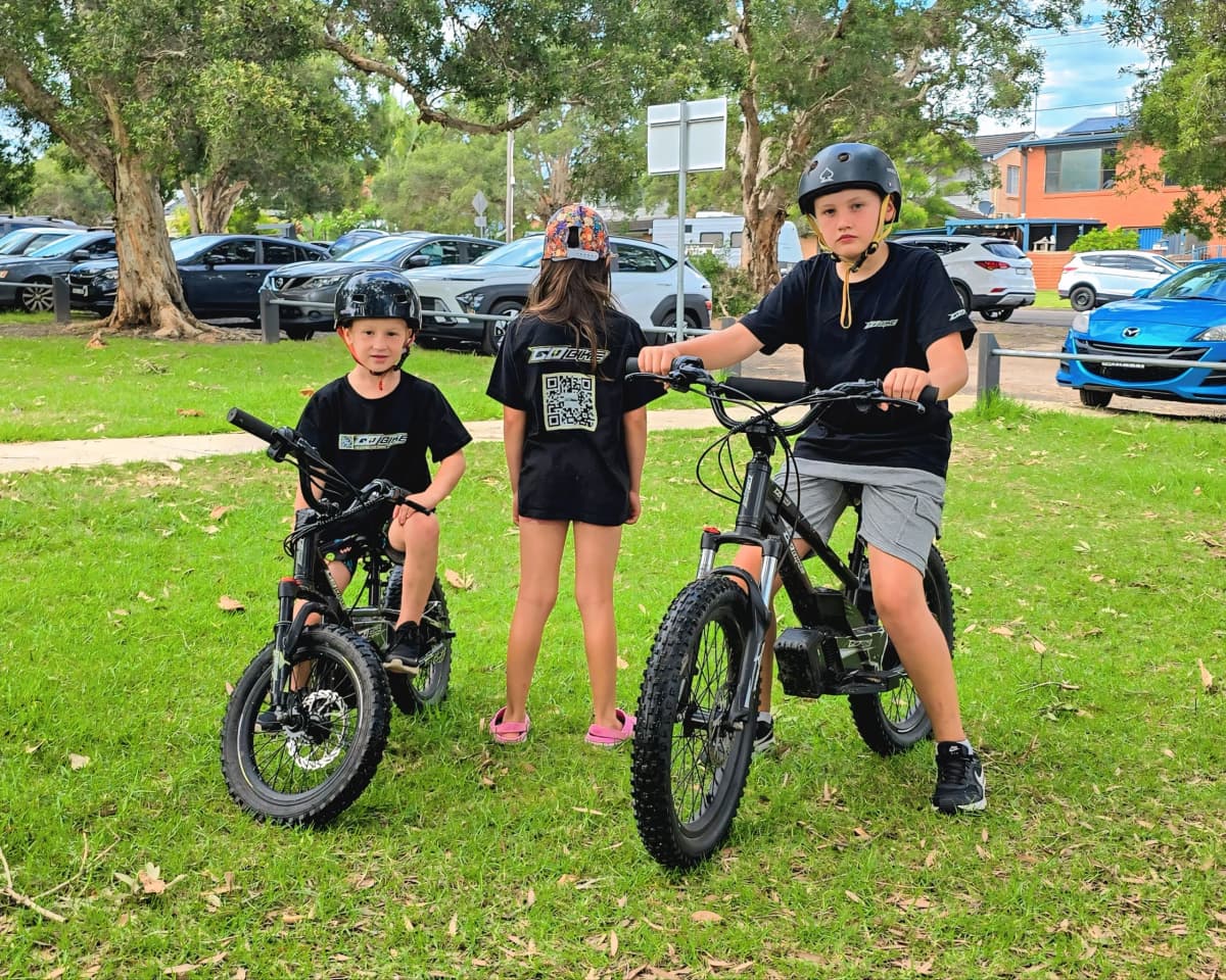 Happy child riding a GoBike electric bike