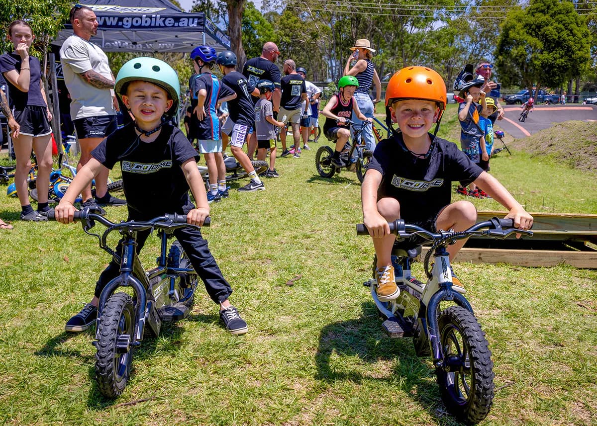 two  kids with the GoBike 12 e-bike